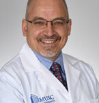 Comisi-John-Dental-Medicine